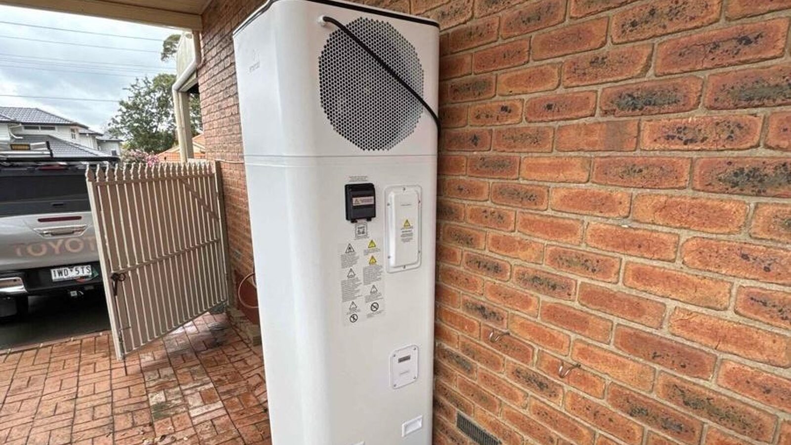 Heat pump hot water system installed at a home under a state energy upgrade programme